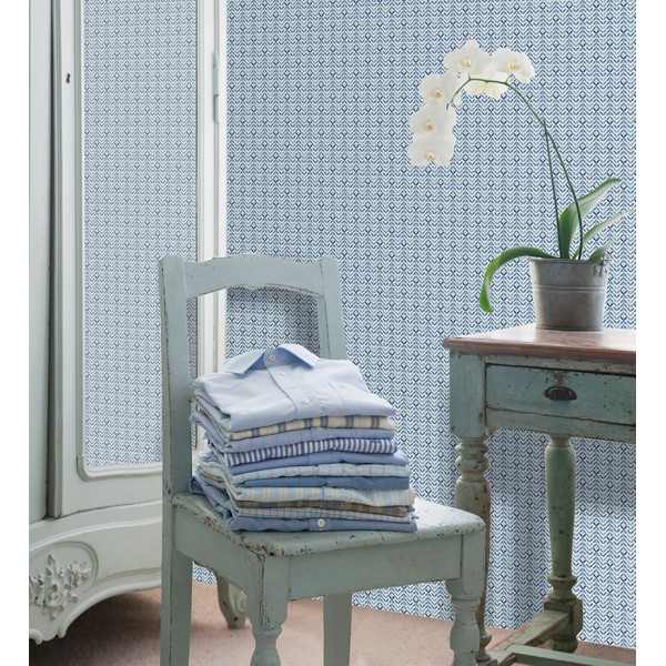 paper pintat nòrdic de color blau amb un fons blanc trencat