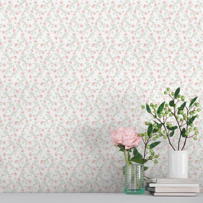 papel de parede com flores pequenas cor vermelho suave e folhas verdes com um fundo branco.