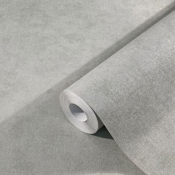 papel de parede texturizado suave em uma cor verde acinzentado.