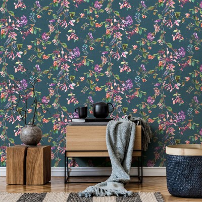 paper pintat branques amb flors i fruits colorits amb fons turquesa fosc.